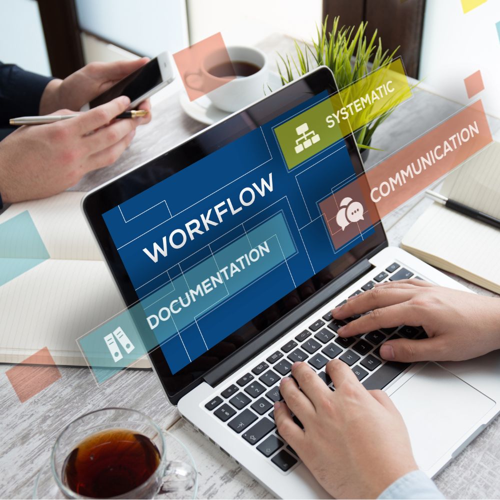 A professional working on a Laptop looking after his company workflow