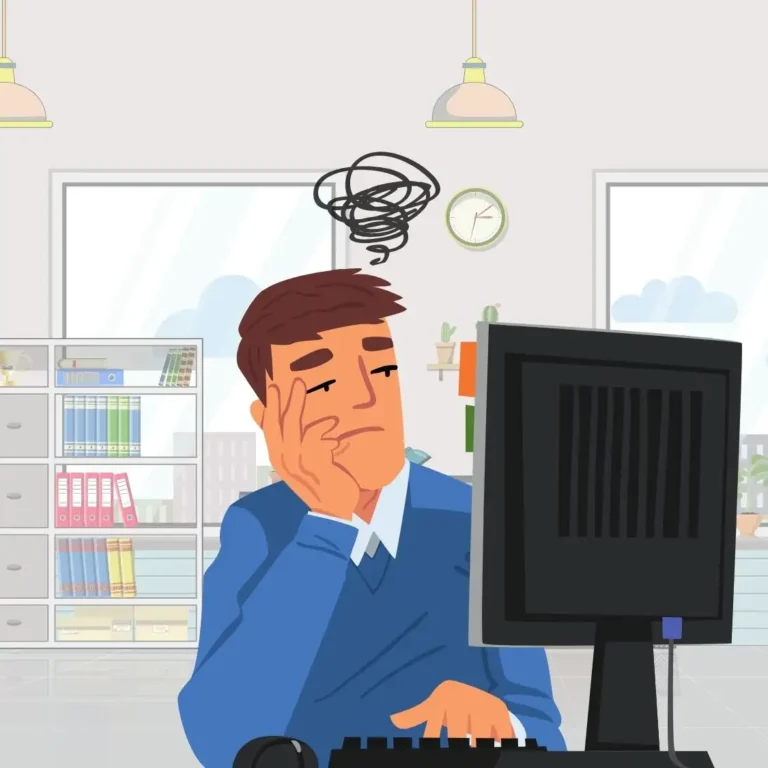 a bored man staring a screen